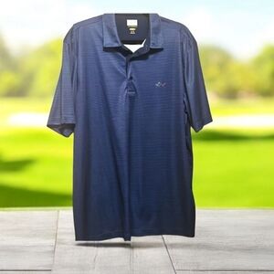 Greg Norman Golf shirt play dry. Blue stripes fish emblem size XL NWOT